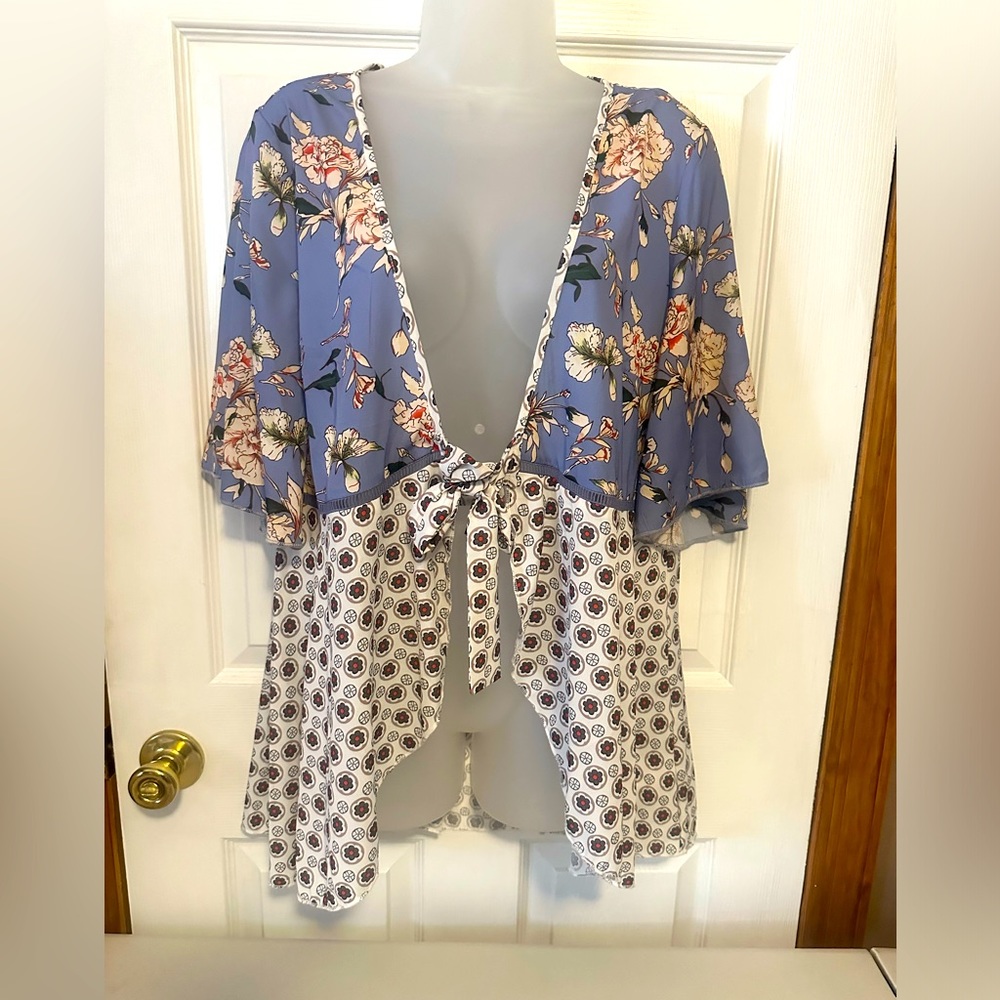 Coverlet, wrap, cover up.